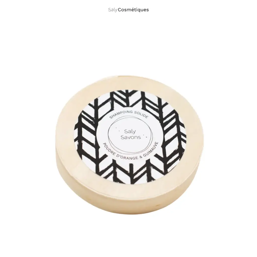 PACKSHOT_SHAMPOING_POUDRE_ORANGE_GUIMAUVE_AVEC_EMBALLAGE.webp
